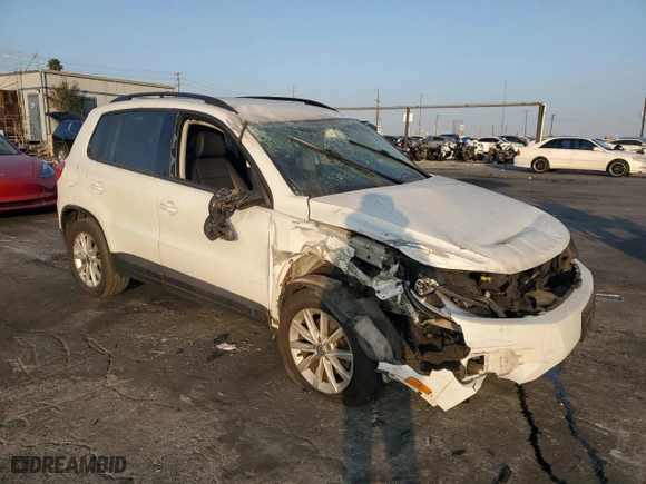 2015 Volkswagen Tiguan S with VIN WVGBV7AX1FW602308, listed as a Copart auction lot 41533115 with 104,098 mi miles and Salvage Title. Bid and sale history available at carsss.com. Image 4.