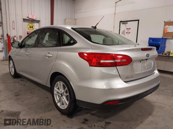 2017 Ford Focus SE z VIN 1FADP3F20HL245291, wystawiony jako IAAI lot #42194880 z przebiegiem 93 764 mil mil oraz . Historia ofert i sprzedaży dostępna na DreamBid. Obrazek 3.