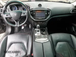 2016 Maserati Ghibli z VIN ZAM57XSA7G1168458, wystawiony jako Copart lot #43611465 z przebiegiem 98 110 mil mil oraz Szkody całkowita. Historia ofert i sprzedaży dostępna na DreamBid. Obrazek 8.