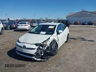 2017 Toyota Prius Two z VIN JTDKARFU4H3053749, wystawiony jako IAAI lot #41816036 z przebiegiem 151 594 mil mil oraz . Historia ofert i sprzedaży dostępna na DreamBid. Obrazek 6.