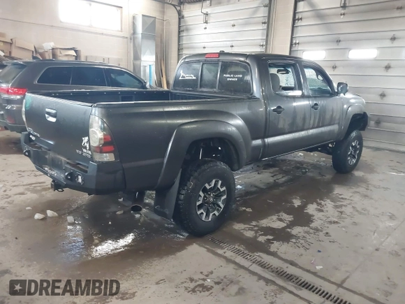 2009 Toyota Tacoma with VIN 5TEMU52N99Z668548, listed as a IAAI auction lot 41507218 with 153,565 mi miles and . Bid and sale history available at DreamBid. Image 4.