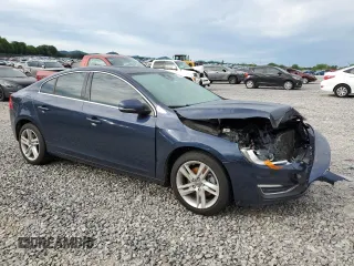 2015 Volvo S60 T5 Drive-E Platinum z VIN YV140MFD8F1313748, wystawiony jako Copart lot #57789415 z przebiegiem 144 185 mil mil oraz Szkoda całkowita • Salvage title. Historia ofert i sprzedaży dostępna na DreamBid. Obrazek 4.
