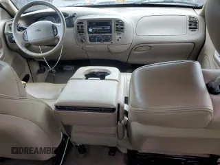 2002 Ford F-150 XL with VIN 1FTRX18L02NA58574, listed as a Copart auction lot 57156255 with 291,950 mi miles and Salvage title. Bid and sale history available at DreamBid. Image 8.