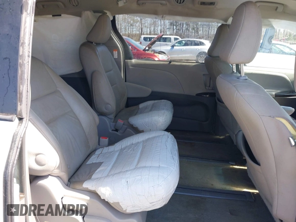 2017 Toyota Sienna with VIN 5TDDZ3DC9HS164773, listed as a IAAI auction lot 41811899 with 100,301 mi miles and . Bid and sale history available at DreamBid. Image 8.