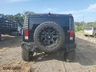 2005 Hummer H2 SUV with VIN 5GRGN23UX5H118848, listed as a Copart auction lot 71882334 with 147,976 mi miles and Clean Title. Bid and sale history available at carsss.com. Image 6.