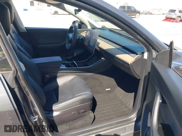 2021 Tesla Model Y Long Range with VIN 5YJYGDEE4MF119249, listed as a IAAI auction lot 41764711 with 87,796 mi miles. Bid and sale history available at carsss.com. Image 5.