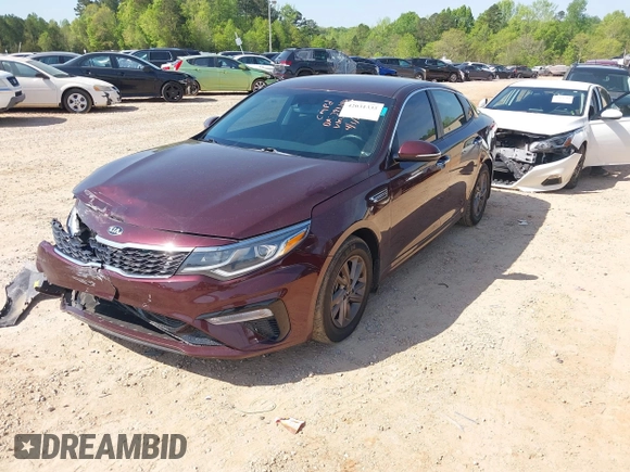 2020 Kia Optima LX with VIN 5XXGT4L3XLG451698, listed as a IAAI auction lot 42031333 with 68,714 mi miles and . Bid and sale history available at DreamBid. Image 2.