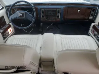 1992 Cadillac Brougham with VIN 1G6DW54E5NR708009, listed as a Copart auction lot 56849345 with 83,203 mi miles and Salvage title. Bid and sale history available at DreamBid. Image 8.