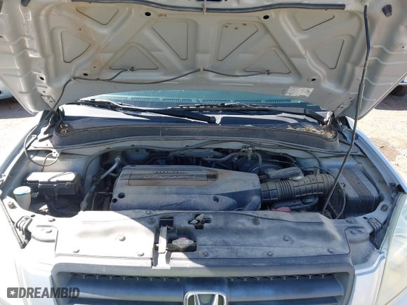 2004 Honda Pilot EX with VIN 2HKYF18674H581196, listed as a IAAI auction lot 42043003 with 220,102 mi miles. Bid and sale history available at carsss.com. Image 10.