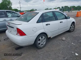 2000 Ford Focus SE with VIN 1FAFP3430YW260053, listed as a IAAI auction lot 42166070 with 114,761 mi miles and . Bid and sale history available at carsss.com. Image 4.
