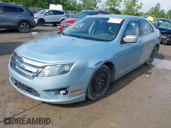 2011 Ford Fusion Hybrid z VIN 3FADP0L30BR123857, wystawiony jako IAAI lot #42534556 z przebiegiem 144 811 mil mil oraz . Historia ofert i sprzedaży dostępna na DreamBid. Obrazek 2.