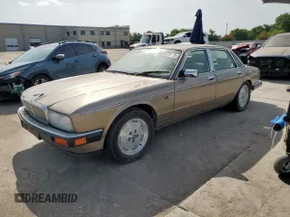 1994 Jaguar XJ with VIN SAJKX174XRC692378, listed as a Copart auction lot 65275795 with 80,748 mi miles and Clean title. Bid and sale history available at DreamBid. Image 1.