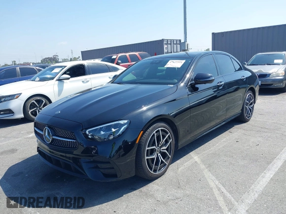2021 Mercedes-Benz E-Class E 350 with VIN W1KZF8DB5MA971128, listed as a IAAI auction lot 42157523 with 130,320 mi miles. Bid and sale history available at carsss.com. Image 2.