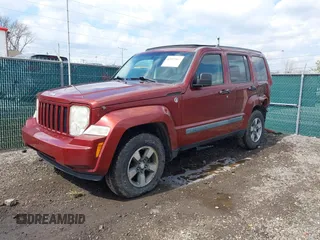 2008 Jeep Liberty Sport with VIN 1J8GN28K68W111462, listed as a IAAI auction lot 42012567 with 129,077 mi miles. Bid and sale history available at carsss.com. Image 2.