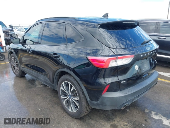 2021 Ford Escape SE with VIN 1FMCU0G62MUA12575, listed as a IAAI auction lot 42293939 with 96,359 mi miles and . Bid and sale history available at DreamBid. Image 3.