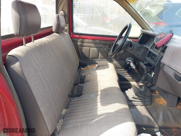 1987 Nissan Hardbody with VIN 1N6ND11S5HC335231, listed as a IAAI auction lot 41833266 with 199,899 mi miles. Bid and sale history available at carsss.com. Image 8.