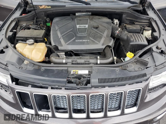 2015 Jeep Grand Cherokee Summit with VIN 1C4RJFJM7FC928257, listed as a Copart auction lot 82525714 with 148,208 mi miles and Salvage Title. Bid and sale history available at carsss.com. Image 13.