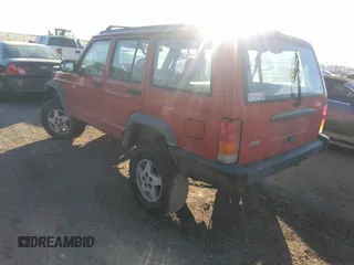 1997 Jeep Cherokee SE z VIN 1J4FJ28S4VL559673, wystawiony jako IAAI lot #41120546 z przebiegiem 272 358 mil mil oraz . Historia ofert i sprzedaży dostępna na DreamBid. Obrazek 3.