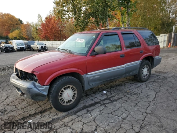 1999 GMC Jimmy SLE with VIN 1GKDT13W6X2508118, listed as a Copart auction lot 79761444 with 195,738 mi miles and Salvage Title. Bid and sale history available at carsss.com. Image 1.