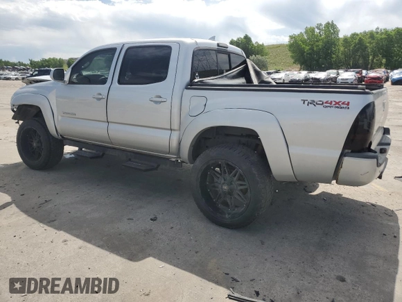2012 Toyota Tacoma with VIN 5TFLU4ENXCX027960, listed as a Copart auction lot 60689025 with 209,480 mi miles and Salvage title. Bid and sale history available at DreamBid. Image 2.