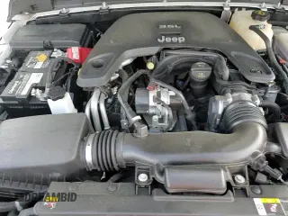 2021 Jeep Wrangler Unlimited 80th Anniversary с VIN 1C4HJXDG9MW557704, выставлен на аукционе Copart как лот 86307875 с пробегом 29 196 миль миль и Списание • Salvage title. История ставок и продаж доступна на DreamBid. Изображение 17.