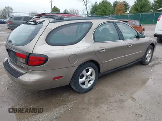 2003 Ford Taurus SE with VIN 1FAHP58U83A195059, listed as a IAAI auction lot 41931098 with 211,096 mi miles and . Bid and sale history available at carsss.com. Image 4.