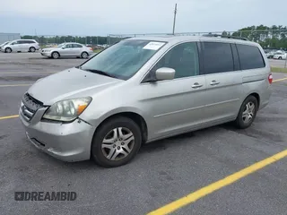 2007 Honda Odyssey EX-L z VIN 5FNRL38647B426620, wystawiony jako IAAI lot #42059093 z przebiegiem 258 622 mil mil oraz . Historia ofert i sprzedaży dostępna na DreamBid. Obrazek 2.
