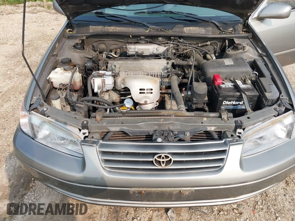 1998 Toyota Camry LE z VIN 4T1BG22K8WU330576, wystawiony jako IAAI lot #42417387 z przebiegiem 99 861 mil mil oraz . Historia ofert i sprzedaży dostępna na DreamBid. Obrazek 10.