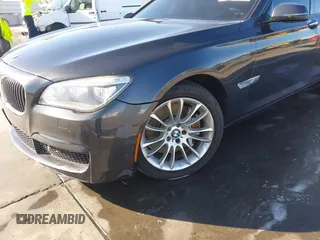2015 BMW 7 Series 750Li with VIN WBAYE8C52FD780902, listed as a IAAI auction lot 40808265 with 102,774 mi miles. Bid and sale history available at carsss.com. Image 6.