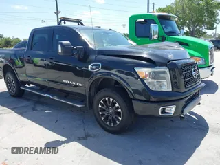 2017 Nissan Titan Platinum Reserve z VIN 1N6AA1F49HN511963, wystawiony jako IAAI lot #42162158 z przebiegiem 253 416 mil mil oraz . Historia ofert i sprzedaży dostępna na DreamBid. Obrazek 1.