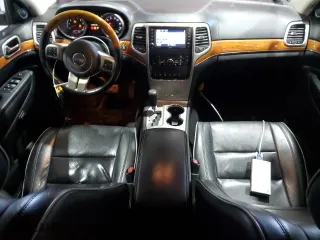 2012 Jeep Grand Cherokee Overland with VIN 1C4RJFCT8CC171384, listed as a Copart auction lot 48164355 with 213,848 mi miles and Salvage Title. Bid and sale history available at carsss.com. Image 8.