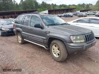 2004 Jeep Grand Cherokee Laredo with VIN 1J4GX48S14C176318, listed as a IAAI auction lot 41887810 with 1 mi miles. Bid and sale history available at carsss.com. Image 1.