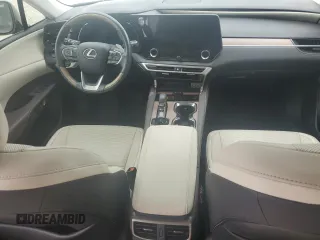 2023 Lexus RX with VIN 2T2BBMCA7PC001561, listed as a Copart auction lot 74133804 with 17,180 mi miles and Non Repairable. Bid and sale history available at carsss.com. Image 8.