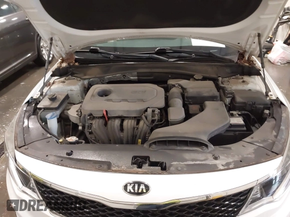 2016 Kia Optima LX with VIN 5XXGT4L38GG048180, listed as a IAAI auction lot 41923650 with 58,018 mi miles. Bid and sale history available at carsss.com. Image 10.