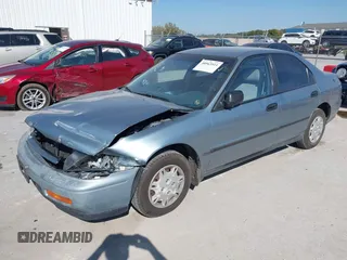 1995 Honda Accord DX with VIN 1HGCD562XSA045128, listed as a IAAI auction lot 40563511 with 143,206 mi miles. Bid and sale history available at carsss.com. Image 2.