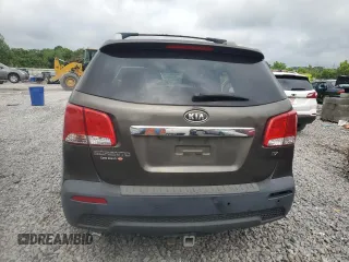 2012 Kia Sorento EX z VIN 5XYKU3A69CG279061, wystawiony jako Copart lot #60088605 z przebiegiem 272 332 mil mil oraz Czysty tytuł • Clean title. Historia ofert i sprzedaży dostępna na DreamBid. Obrazek 6.