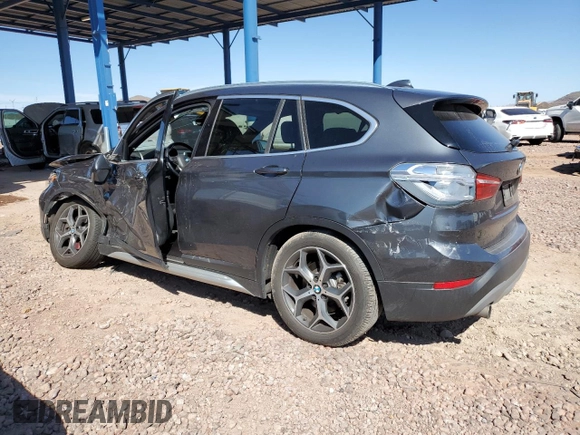 2017 BMW X1 xDrive28i with VIN WBXHT3C32H5F79403, listed as a Copart auction lot 50182775 with 71,003 mi miles and Salvage Title. Bid and sale history available at carsss.com. Image 2.