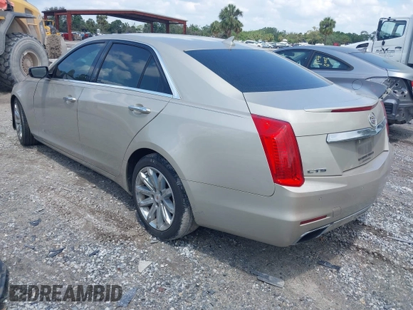 2014 Cadillac CTS Luxury RWD z VIN 1G6AR5SX4E0141195, wystawiony jako IAAI lot #42144565 z przebiegiem 80 267 mil mil oraz . Historia ofert i sprzedaży dostępna na DreamBid. Obrazek 3.