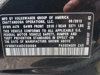2013 Volkswagen Passat SE w/Sunroof with VIN 1VWBH7A36DC020984, listed as a IAAI auction lot 41883902 with 169,916 mi miles. Bid and sale history available at carsss.com. Image 9.