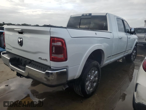 2022 Ram 2500 Limited with VIN 3C6UR5TL7NG338869, listed as a Copart auction lot 74421184 with 21,579 mi miles and Salvage title. Bid and sale history available at DreamBid. Image 3.