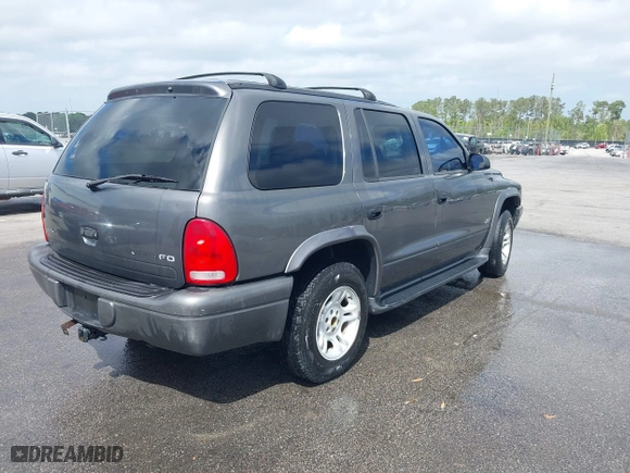 2002 Dodge Durango Sport with VIN 1B4HR38N32F213399, listed as a IAAI auction lot 41927441 with 288,016 mi miles. Bid and sale history available at carsss.com. Image 4.