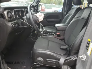 2020 Jeep Wrangler Unlimited Freedom with VIN 1C4HJXDG0LW285901, listed as a Copart auction lot 52193555 with 63,823 mi miles and Salvage title. Bid and sale history available at DreamBid. Image 7.