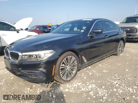 2018 BMW 5 Series 530i xDrive with VIN WBAJA7C55JWA74479, listed as a Copart auction lot 59689085 with 114,329 mi miles and Salvage title. Bid and sale history available at DreamBid. Image 1.