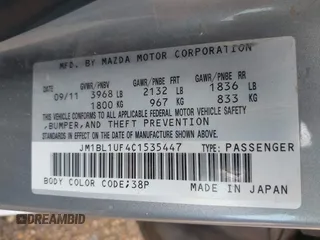 2012 Mazda 3 i Sport with VIN JM1BL1UF4C1535447, listed as a IAAI auction lot 42073084 with 121,185 mi miles and . Bid and sale history available at DreamBid. Image 9.