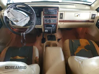 1995 Jeep Grand Cherokee Limited with VIN 1J4GZ78Y2SC723898, listed as a Copart auction lot 54142035 with 173,454 mi miles and Salvage Title. Bid and sale history available at carsss.com. Image 8.