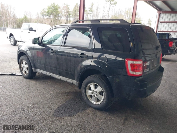 2009 Ford Escape XLT with VIN 1FMCU93G79KC30405, listed as a IAAI auction lot 42043034 with 136,086 mi miles. Bid and sale history available at carsss.com. Image 3.