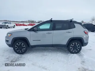 2020 Jeep Compass Trailhawk with VIN 3C4NJDDB1LT203329, listed as a IAAI auction lot 41301931 with 79,035 mi miles and . Bid and sale history available at carsss.com. Image 14.