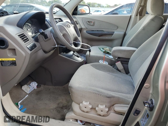 2006 Hyundai Tucson GL with VIN KM8JM12B06U262563, listed as a Copart auction lot 72029874 with 213,624 mi miles and Salvage Title. Bid and sale history available at carsss.com. Image 7.