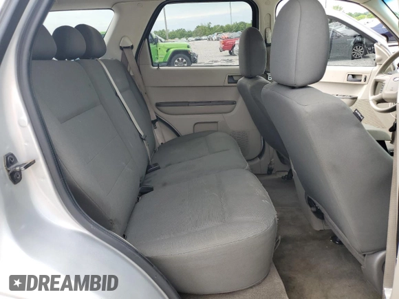 2009 Ford Escape XLS z VIN 1FMCU92789KB10338, wystawiony jako Copart lot #57452495 z przebiegiem 285 171 mil mil oraz Szkoda całkowita • Salvage title. Historia ofert i sprzedaży dostępna na DreamBid. Obrazek 11.