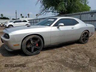 2010 Dodge Challenger SRT-8 z VIN 2B3CJ7DW0AH289123, wystawiony jako Copart lot #53925135 z przebiegiem Nie podano mil oraz Szkoda całkowita • Salvage title. Historia ofert i sprzedaży dostępna na DreamBid. Obrazek 1.